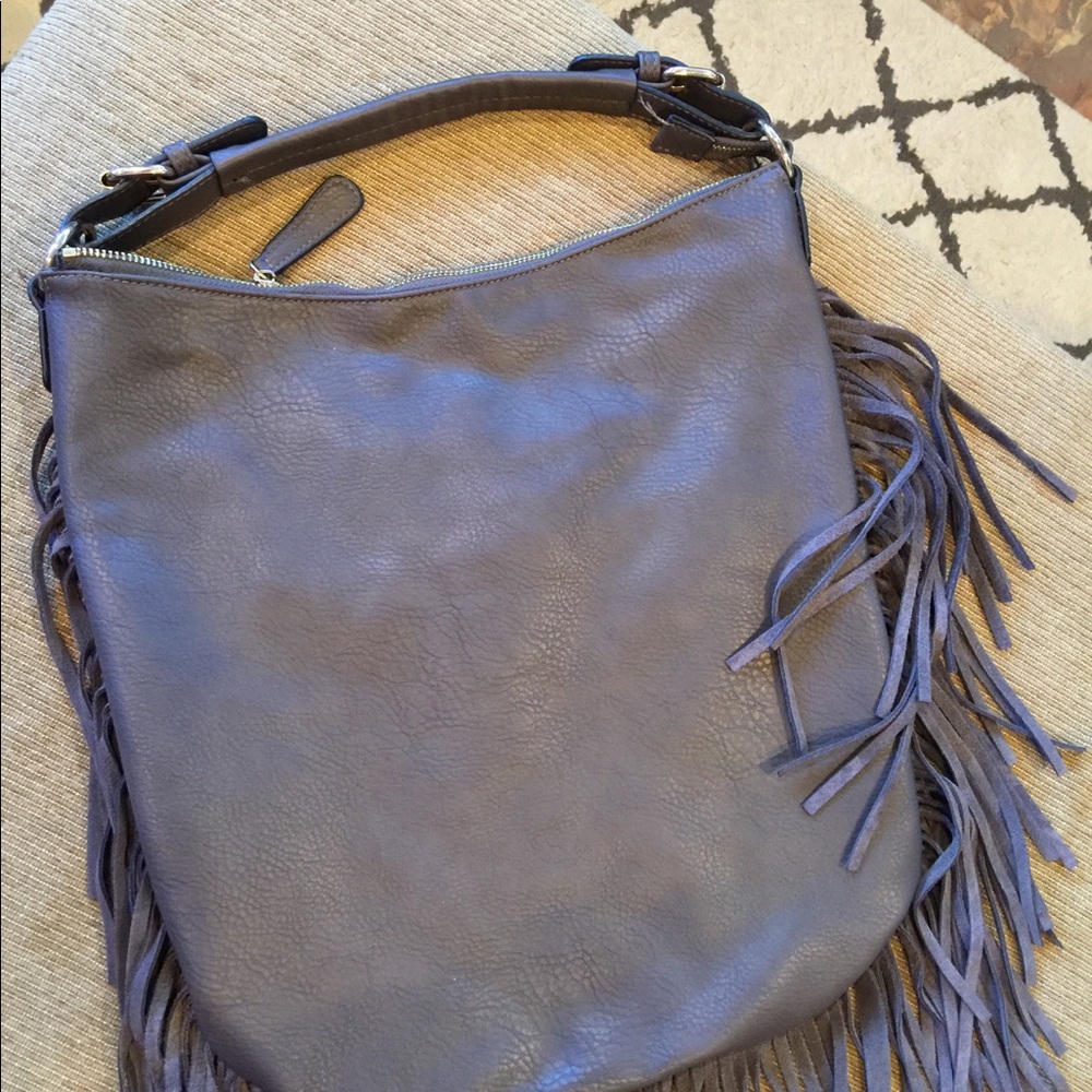 Brown bag with fringe.